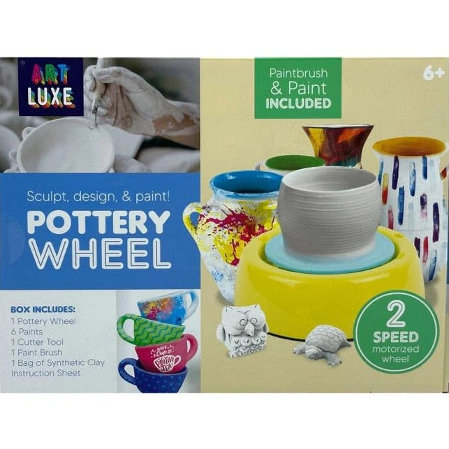 A product box for an Art Luxe pottery wheel for children, including paint.